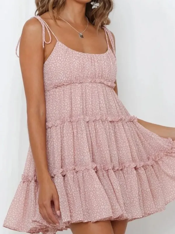 Printed Tie-Strap Tiered Mini Dress sold by Charming Charlie