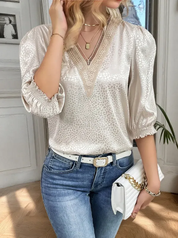 Animal Print V-Neck 3/4 Sleeve Blouse sold by Charming Charlie