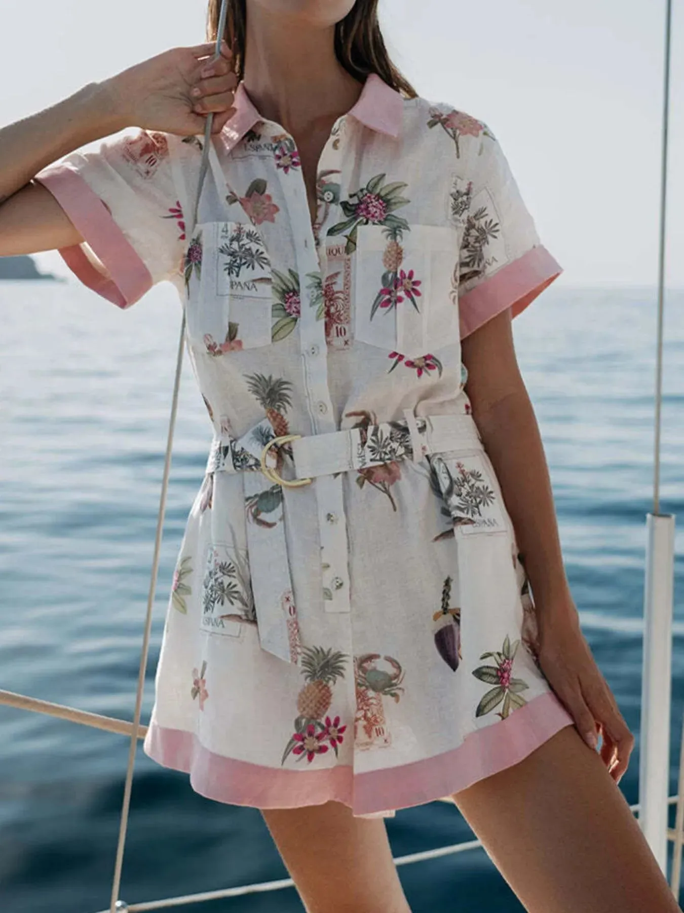 Printed Short Sleeve Romper with Belt sold by Charming Charlie product image thumbnail 2