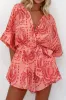 Printed Tie Waist Romper sold by Charming Charlie