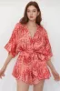 Printed Tie Waist Romper sold by Charming Charlie