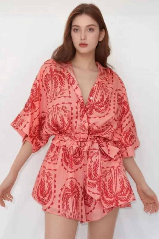 Printed Tie Waist Romper sold by Charming Charlie