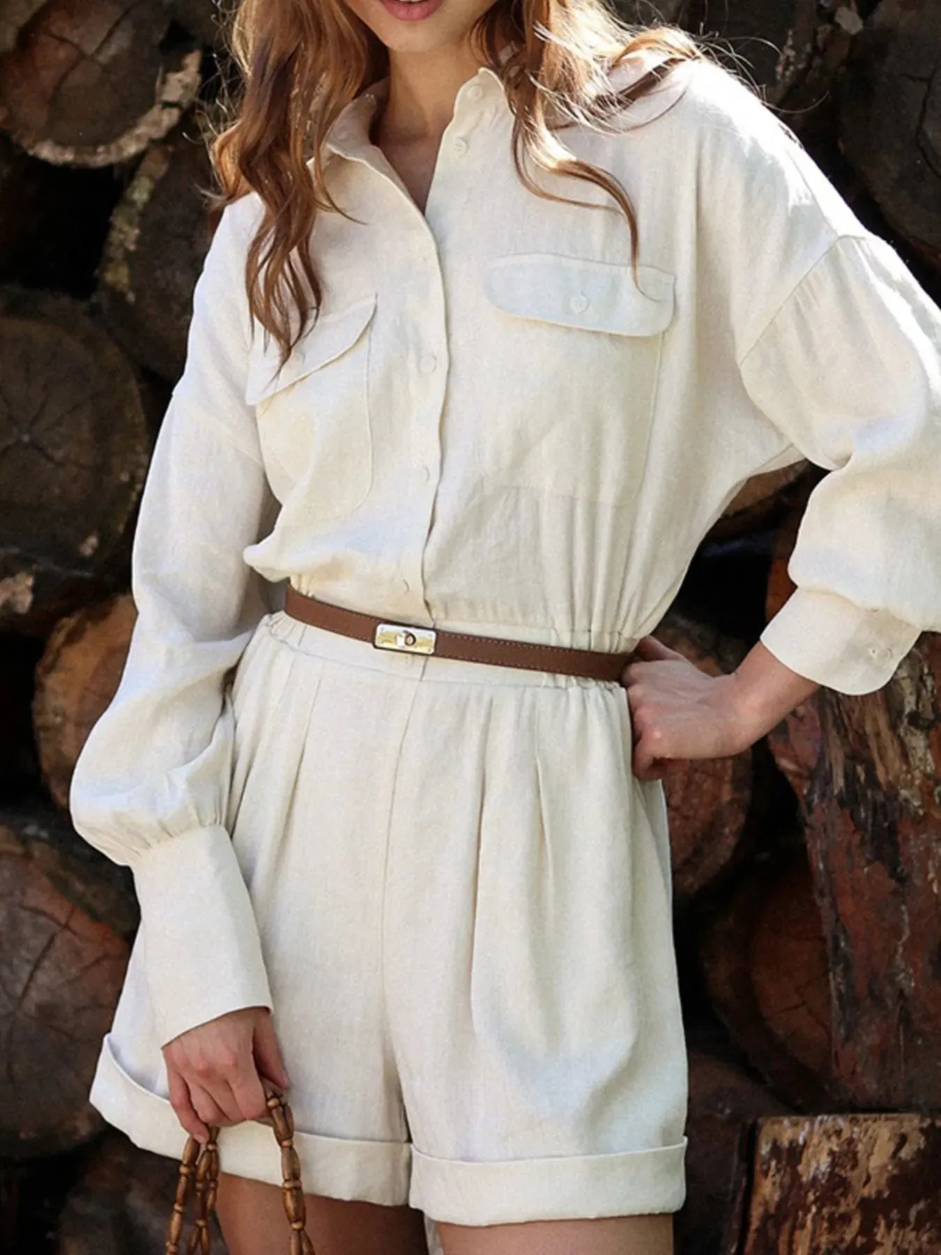 Casual Button Front Long Sleeve Romper sold by Charming Charlie