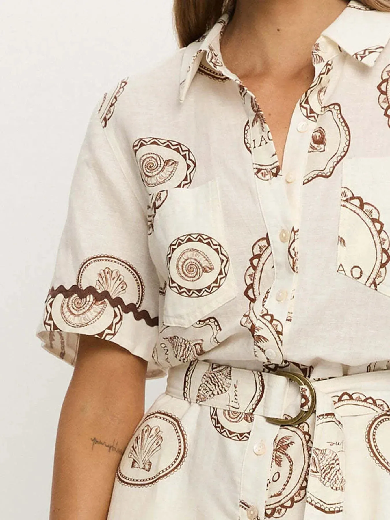 Printed Button-Up Half Sleeve Romper sold by Charming Charlie product image thumbnail 4