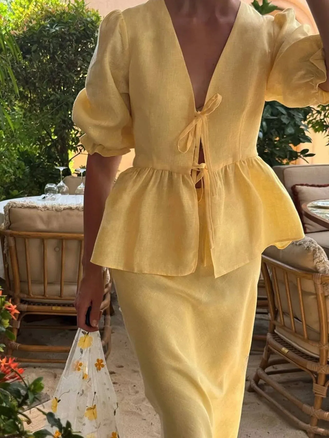 Tie Front Peplum Top and Skirt Set sold by Charming Charlie