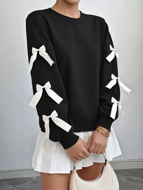 Bow-Detailed Sleeve Round Neck Sweatshirt sold by Charming Charlie