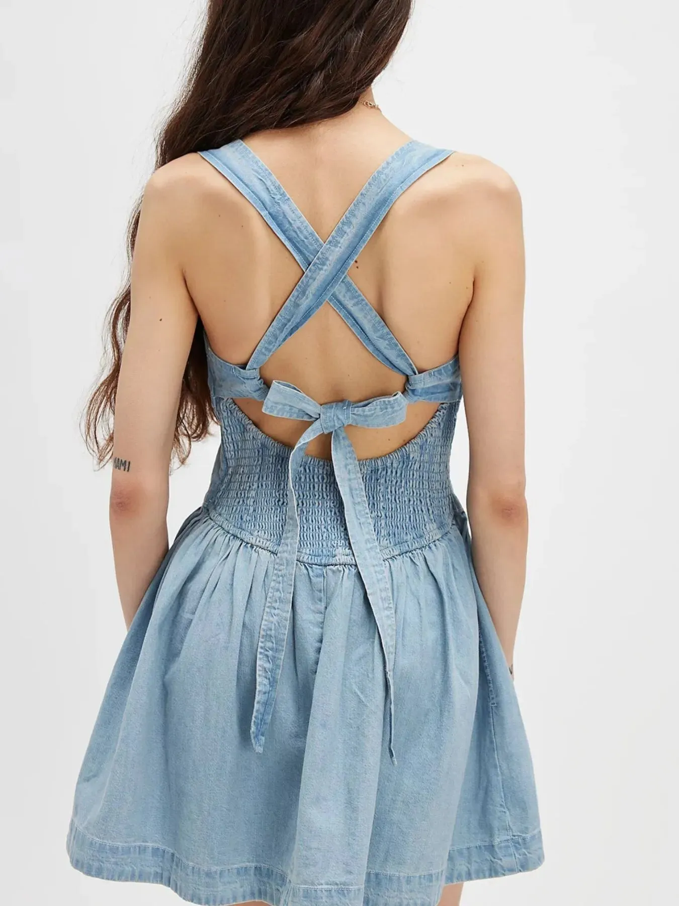 Smocked Crisscross Back Denim Mini Dress sold by Charming Charlie product image thumbnail 3