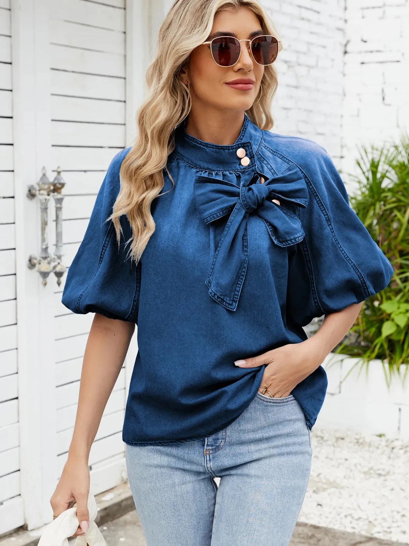 Denim Bow Tie Puff Sleeve Top sold by Charming Charlie