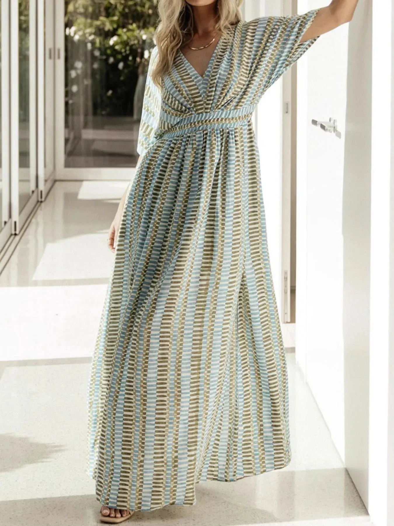 Slit V-Neck Short Sleeve Maxi Dress sold by Charming Charlie