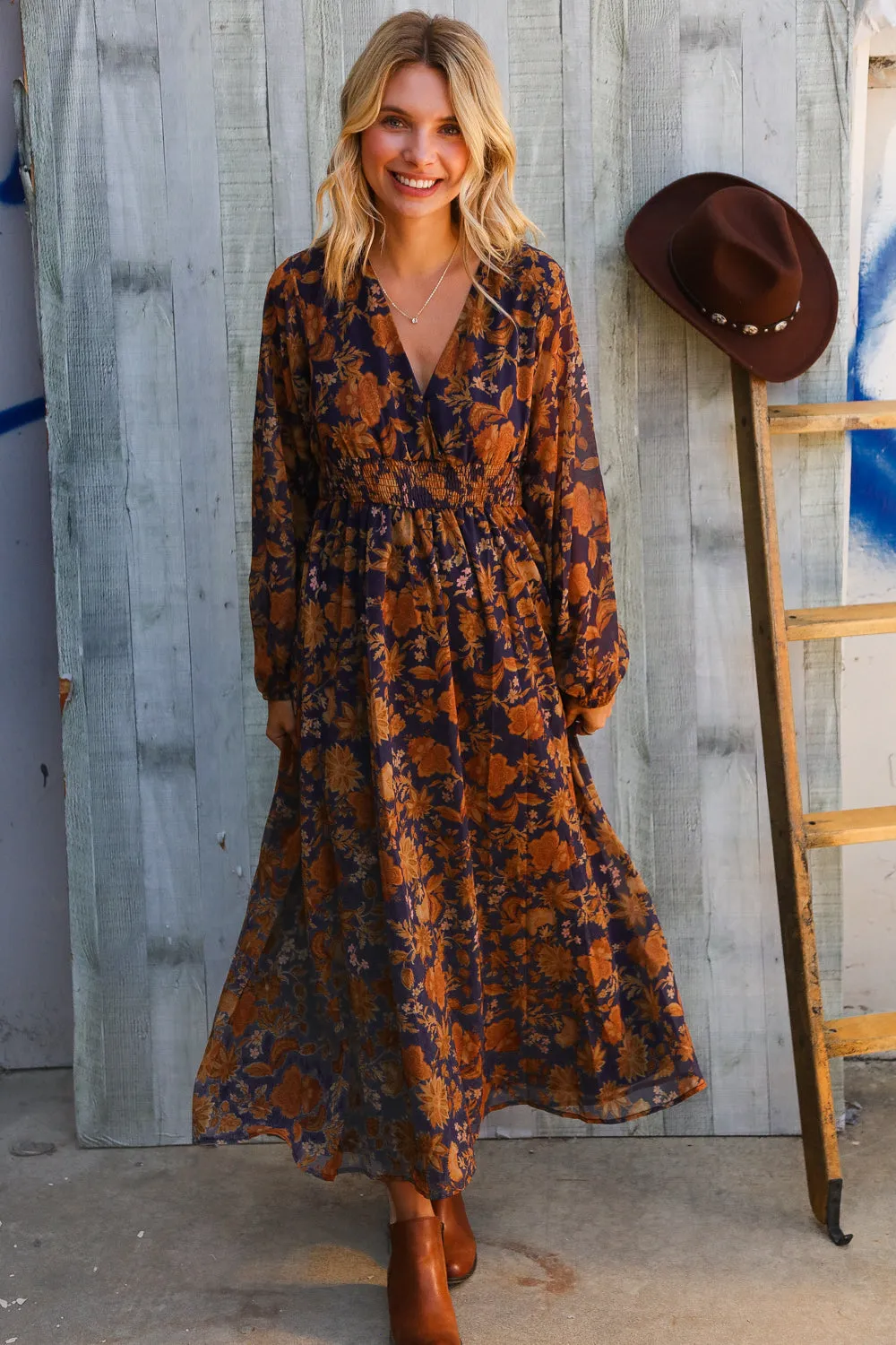 Stunning In Chiffon Floral Smocked Ruffle Sleeve Lined Midi Dress sold by Charming Charlie