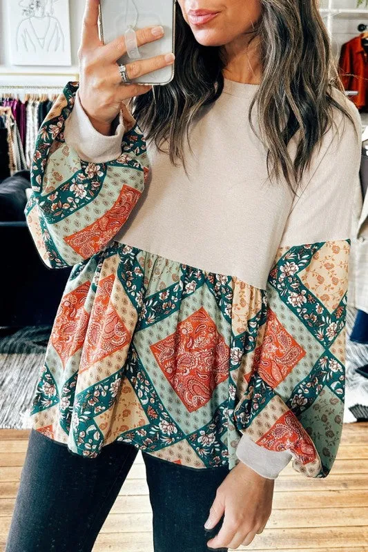 Geometric Patchwork Crew Neck Loose Fit Top sold by Charming Charlie