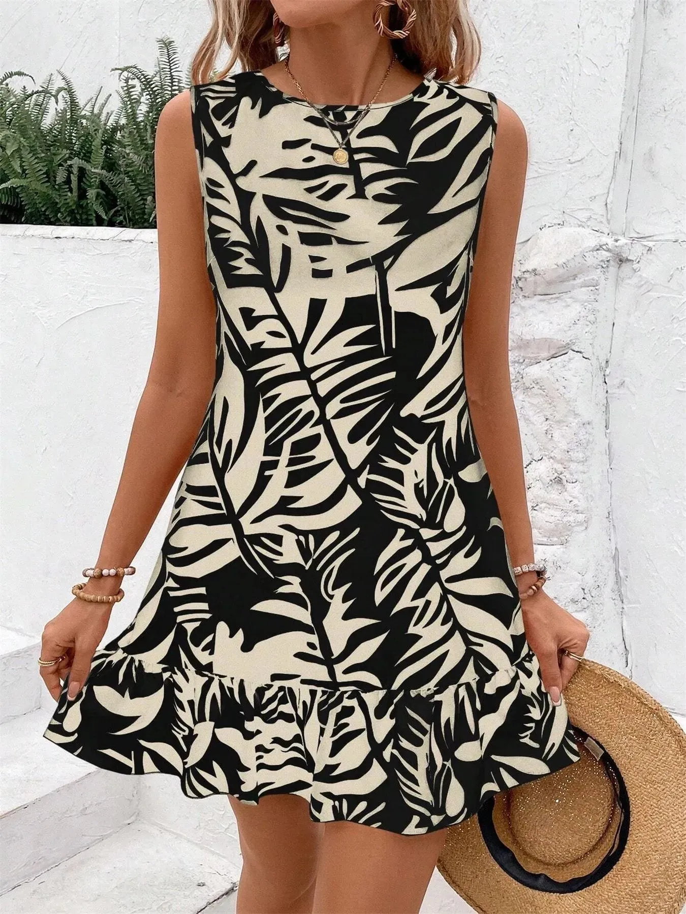 Leaf Print Sleeveless Mini Dress sold by Charming Charlie