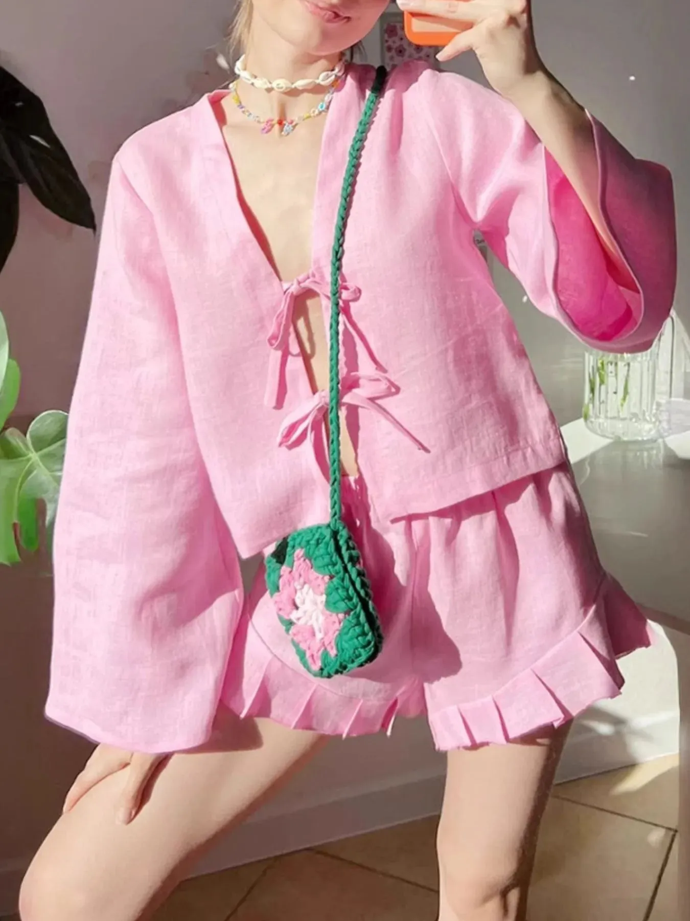 Tie Front Long Sleeve Top and Shorts Set sold by Charming Charlie