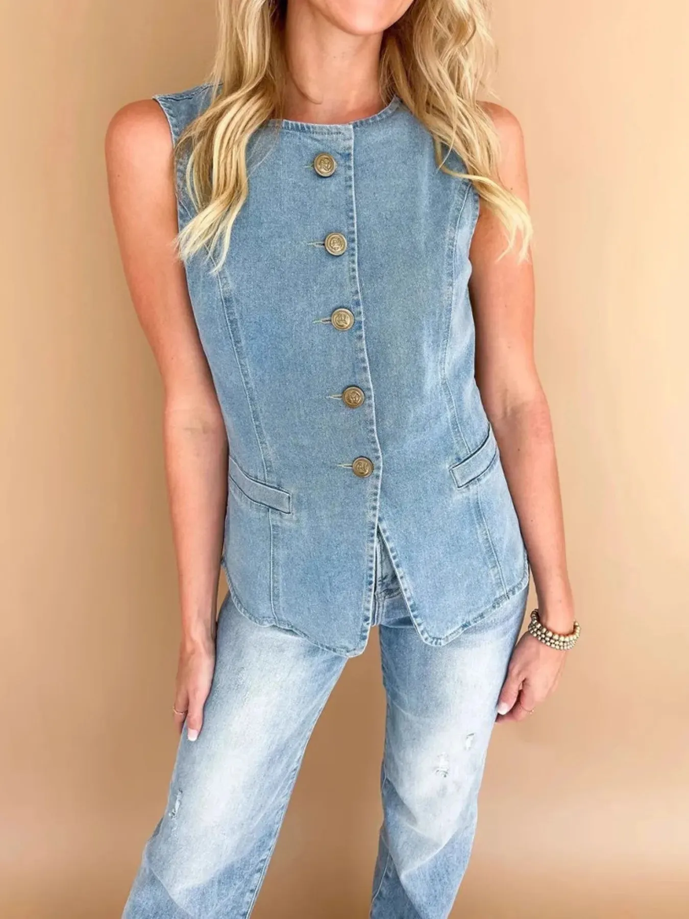 Sleeveless Button-Front Denim Vest sold by Charming Charlie