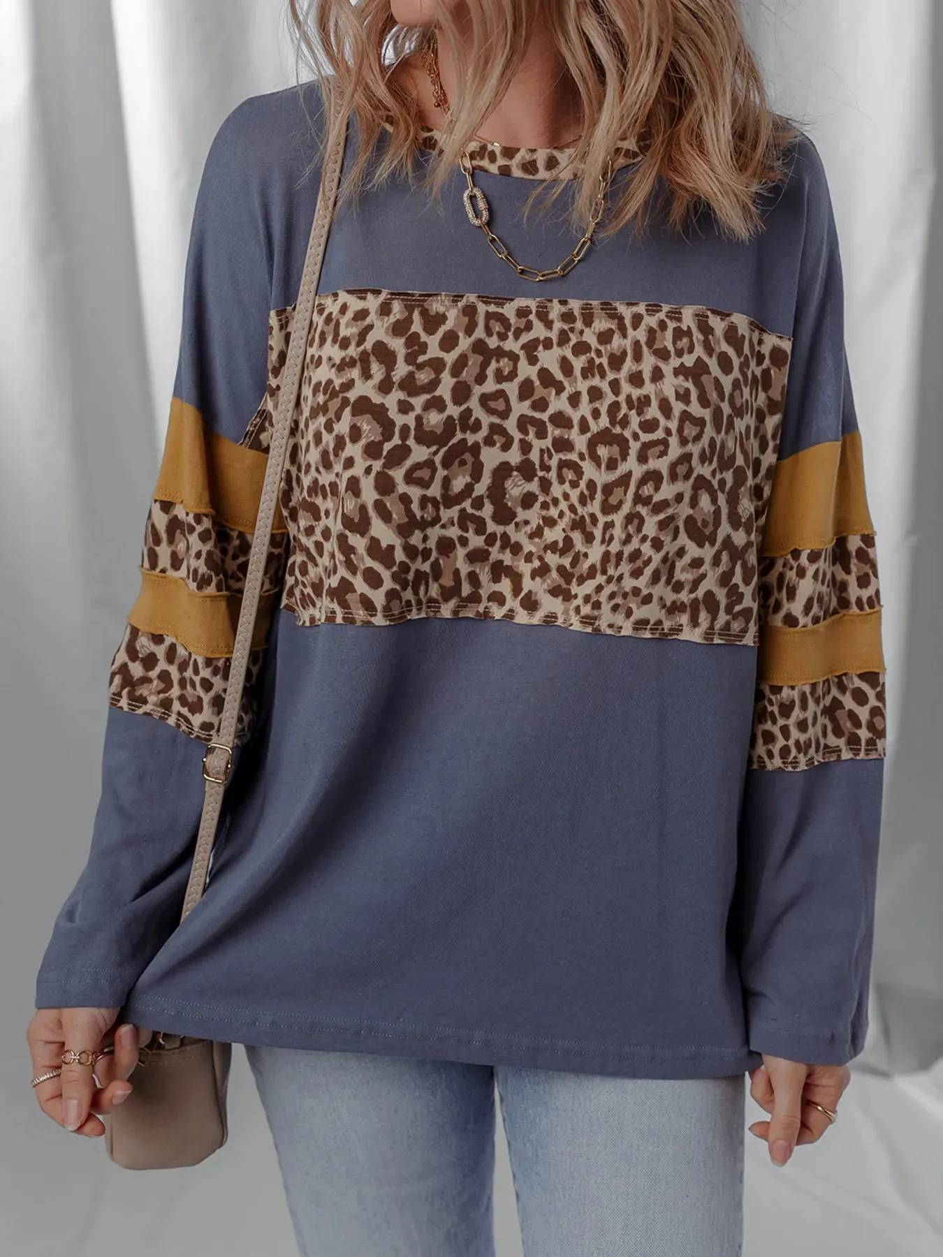 Leopard Color Block Long Sleeve Drop Shoulder Top sold by Charming Charlie
