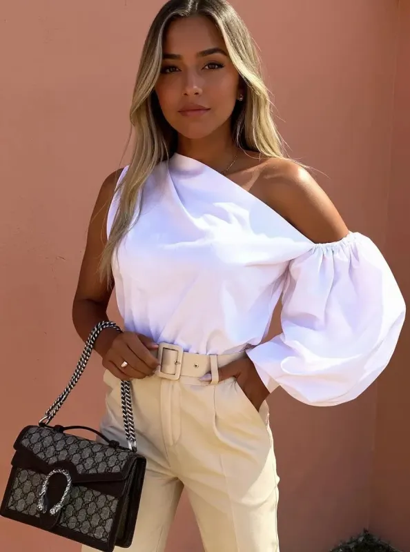 One Shoulder Puff Sleeve Blouse sold by Charming Charlie