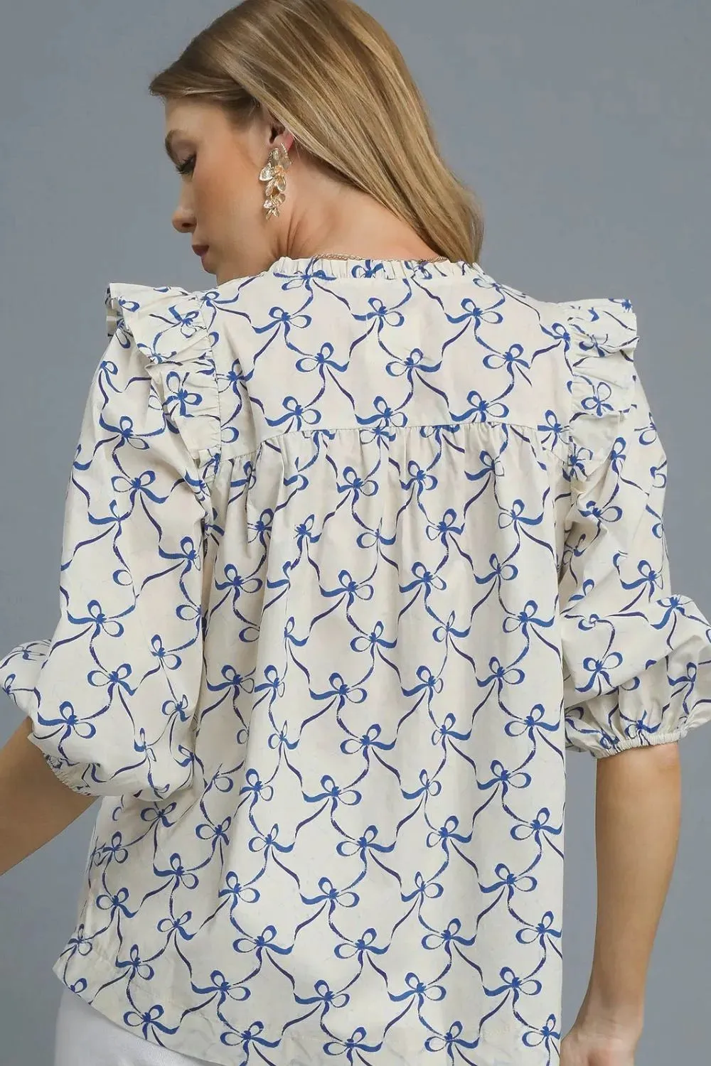 Umgee Ruffled Bow Print Notched Blouse sold by Charming Charlie product image thumbnail 3