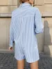 Striped Button Front Long Sleeve Romper sold by Charming Charlie