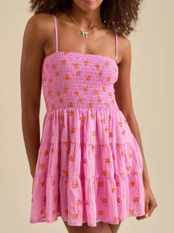 Floral Smocked Tiered Mini Cami Dress sold by Charming Charlie