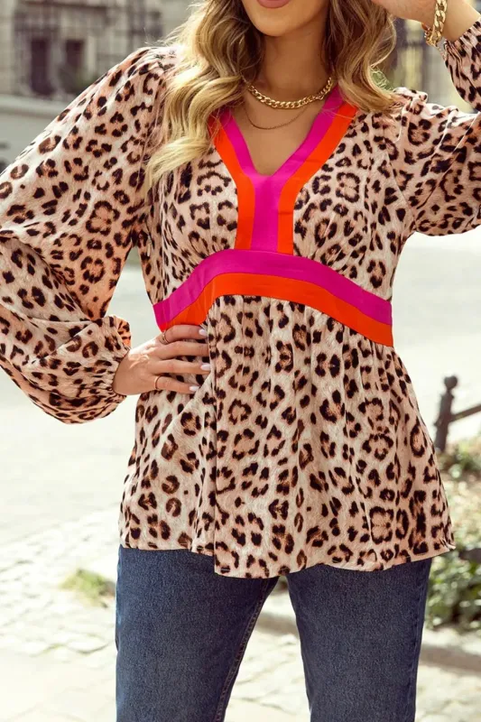 Leopard Print V-Neck Blouse with Contrast Trim sold by Charming Charlie