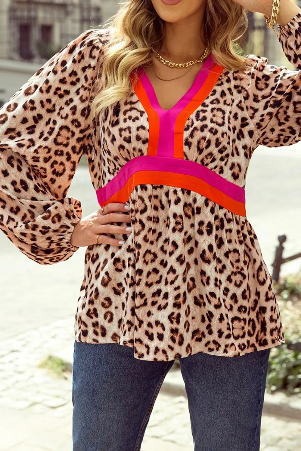 Leopard Print V-Neck Blouse with Contrast Trim sold by Charming Charlie
