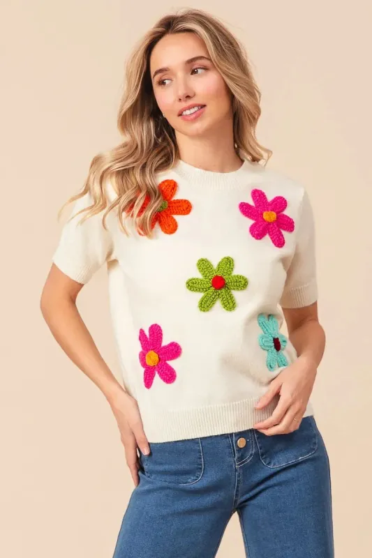 BiBi Crochet Flower Patch Sweater Top sold by Charming Charlie