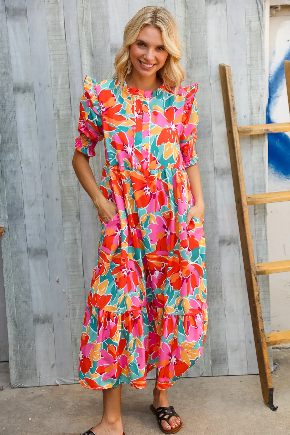 Dazzle In Orange & Aqua Floral Smocked Notched Neck Midi Dress sold by Charming Charlie