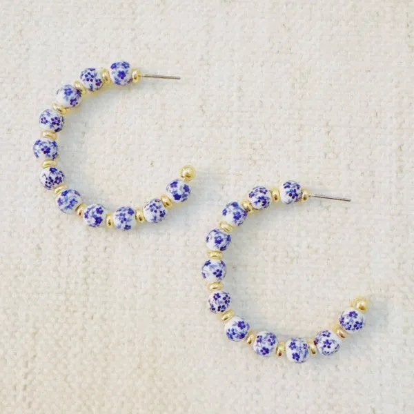 Blue Bloom Floral Hoop Earrings sold by Charming Charlie product image thumbnail 2