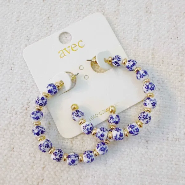 Blue Bloom Floral Hoop Earrings sold by Charming Charlie product image thumbnail 4