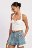 PLEATED DENIM MINI SKIRT WITH CONTRAST HEM DETAIL sold by Charming Charlie