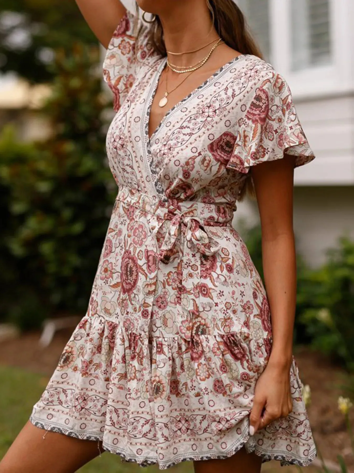 Surplice Flutter Sleeve Mini Dress sold by Charming Charlie product image thumbnail 4