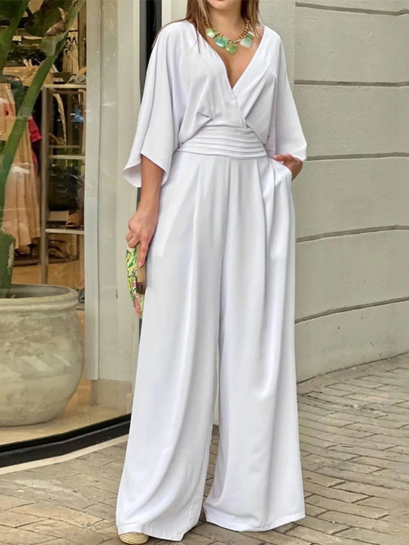 Full Size Wide-Leg Wrap Jumpsuit with Kimono Sleeves Plus Size sold by Charming Charlie