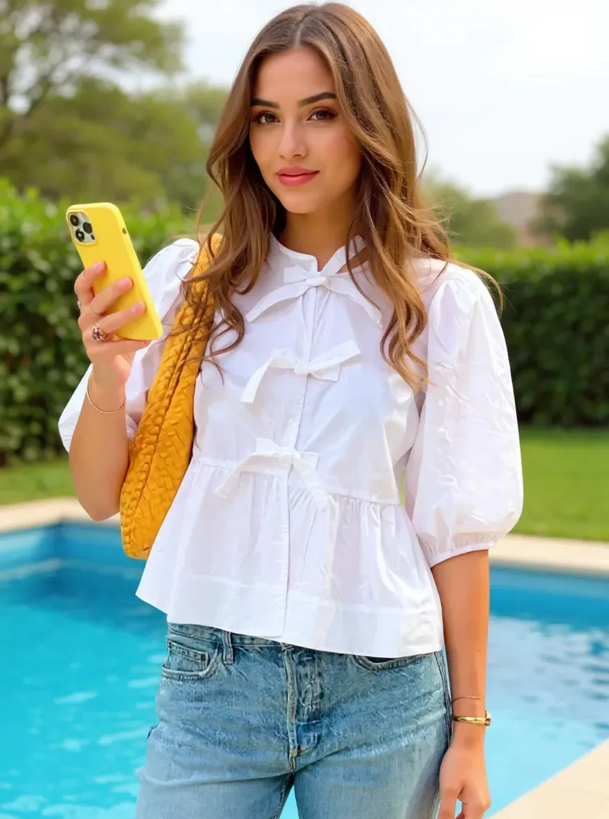 Puff Sleeve Bow Tie Blouse sold by Charming Charlie