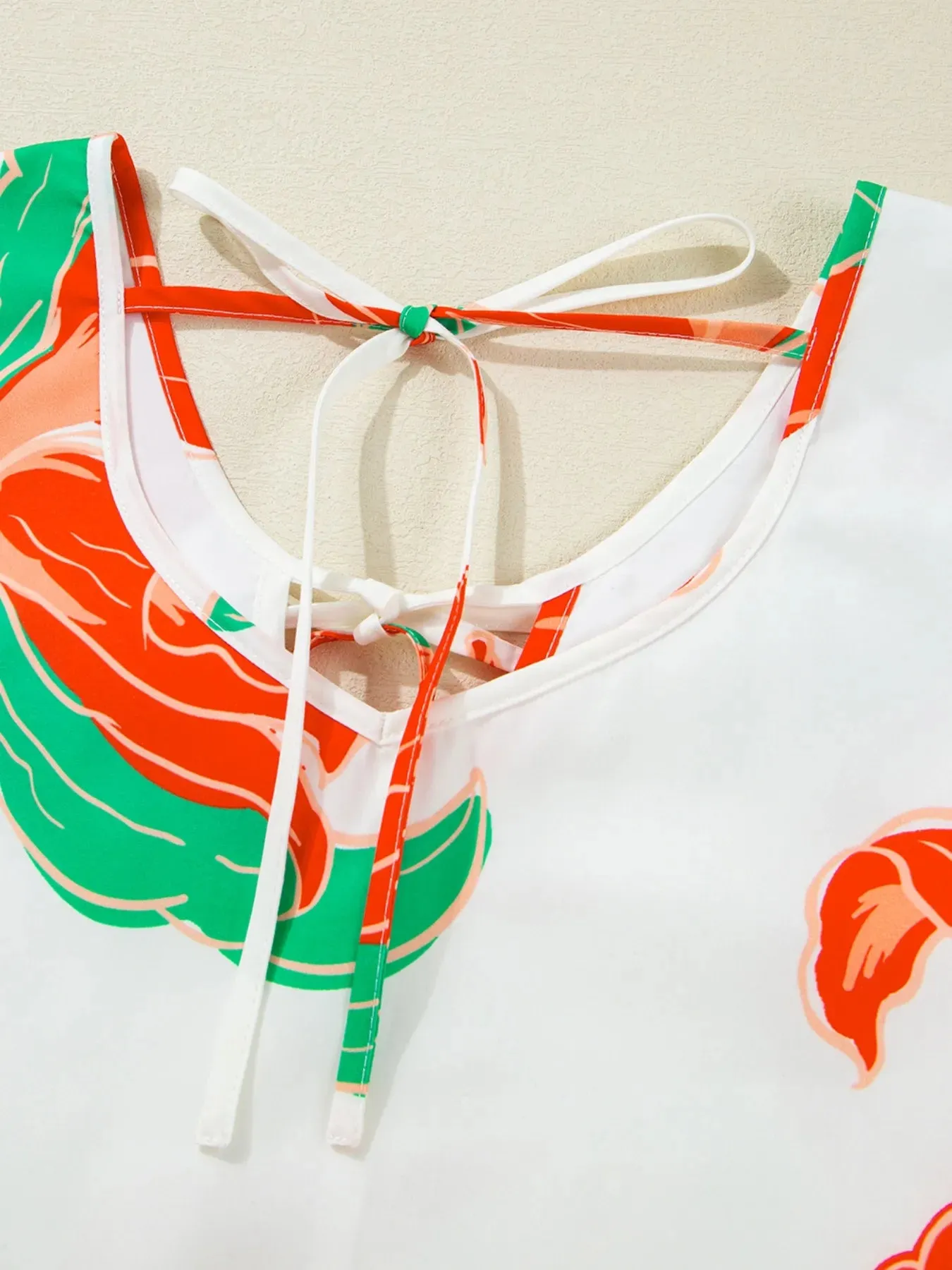 Floral Tie Neck Sleeveless Ruffled Sundress sold by Charming Charlie product image thumbnail 5