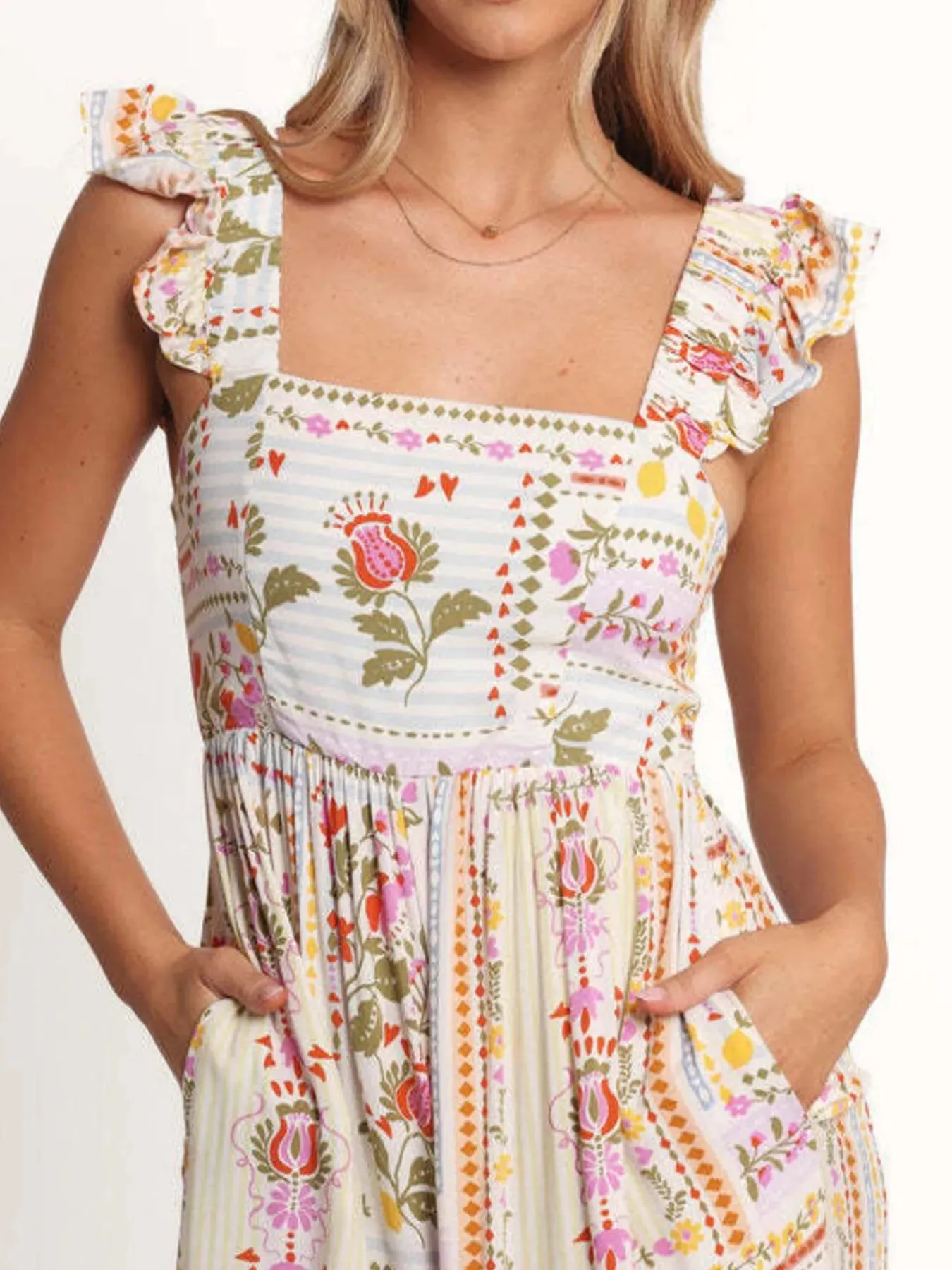 Floral Print Ruffle Strap Jumpsuit sold by Charming Charlie product image thumbnail 3