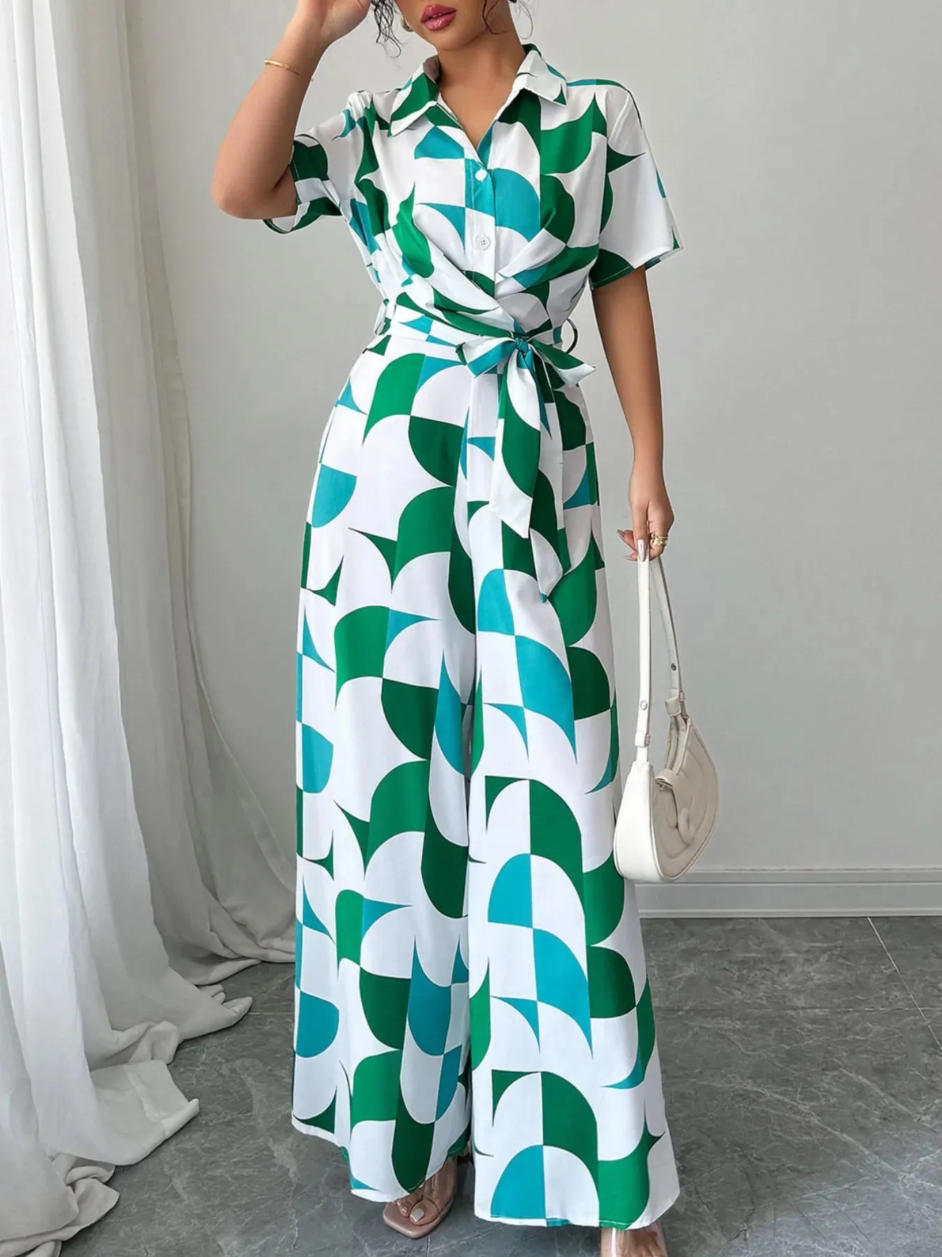 Printed Wide Leg Belted Jumpsuit sold by Charming Charlie product image thumbnail 3