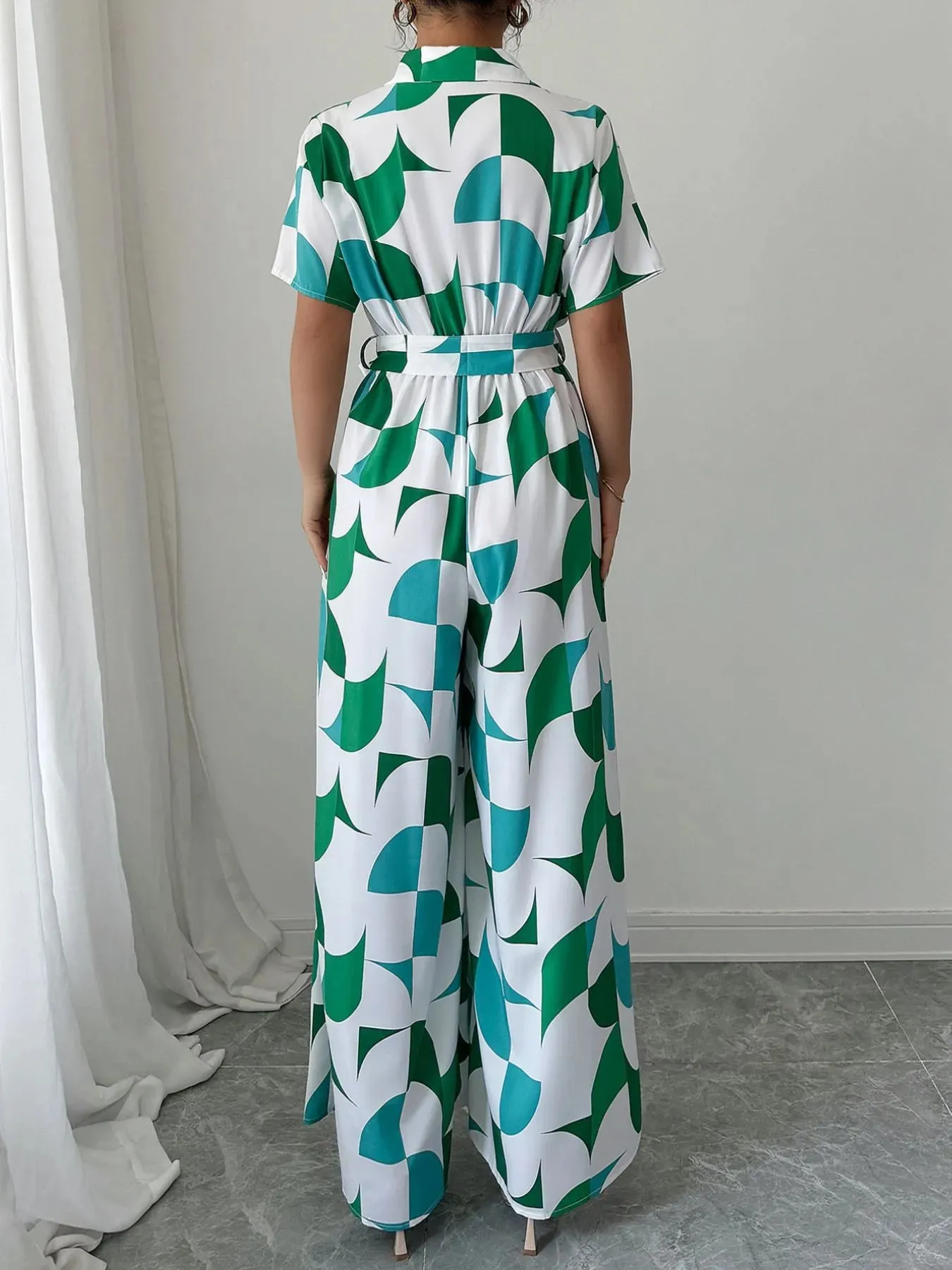 Printed Wide Leg Belted Jumpsuit sold by Charming Charlie product image thumbnail 2