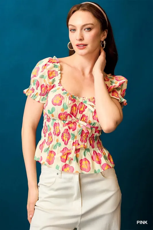 Umgee Floral Smocked Peplum Blouse sold by Charming Charlie