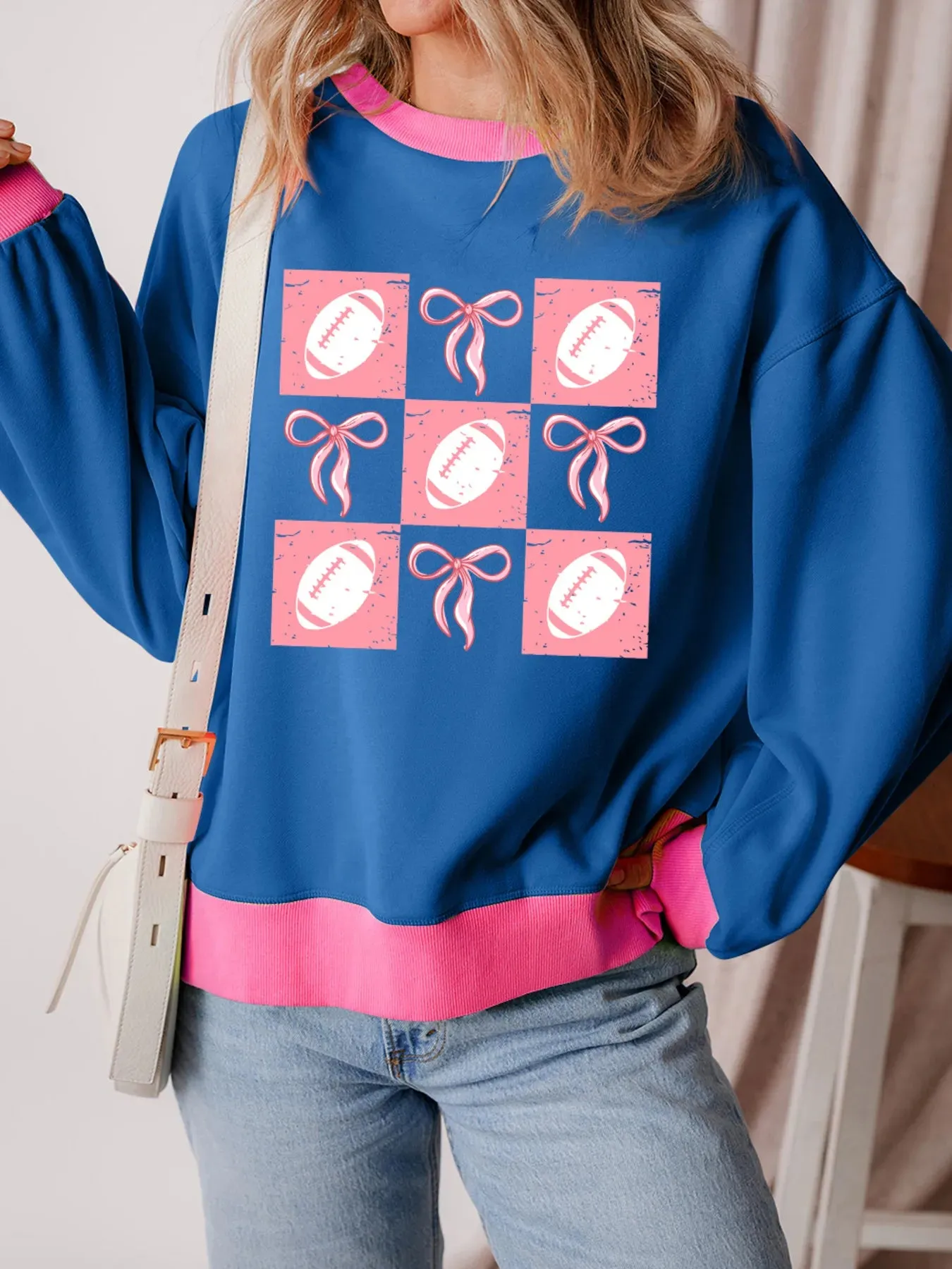 Bowknot Graphic Game Day Contrast Trim Drop Shoulder Casual Sweatshirt sold by Charming Charlie