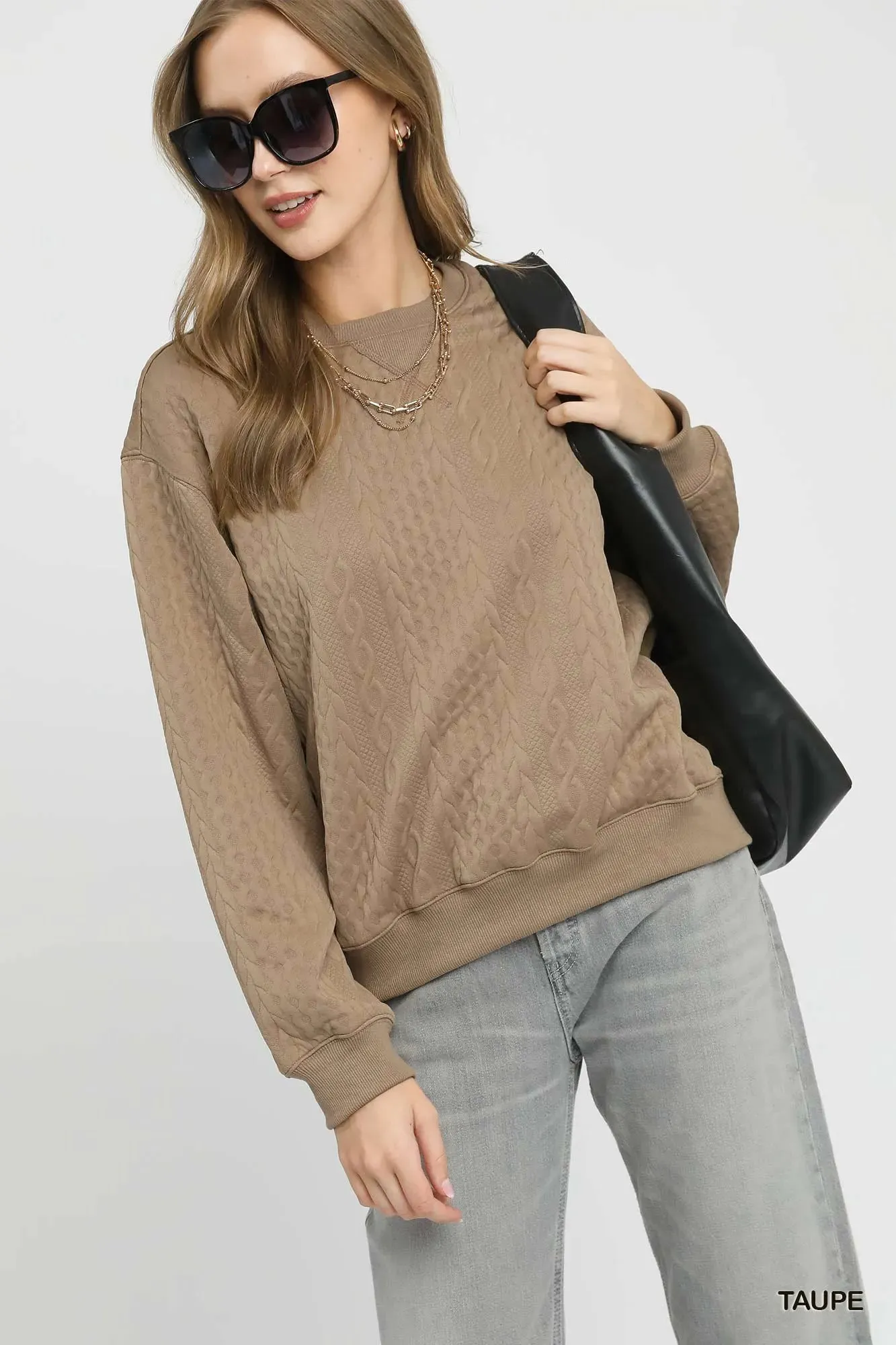 Umgee Cable Texture Pattern Sweatshirt with Ribbed Hem sold by Charming Charlie