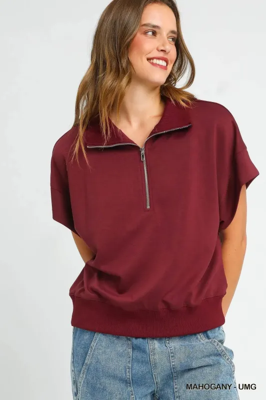 Umgee Full Size Half-Zip Short Sleeve Top Plus Size sold by Charming Charlie