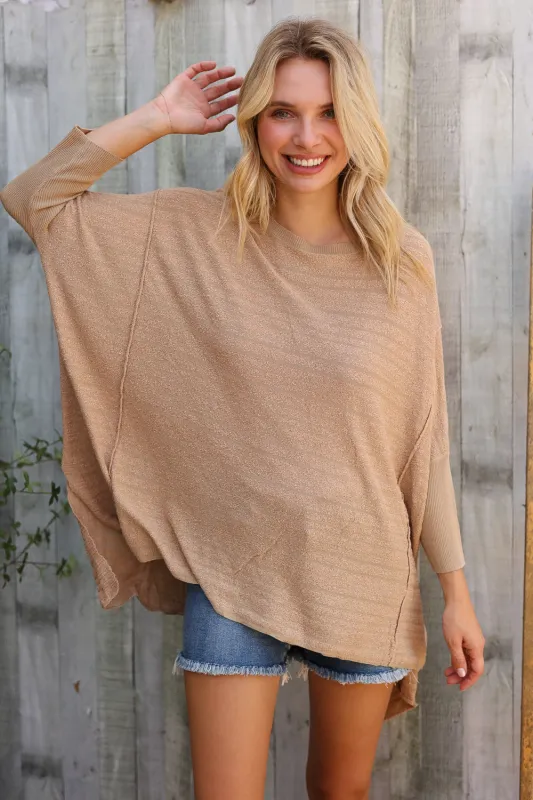 Golden Hour Taupe Hi Low Pullover sold by Charming Charlie