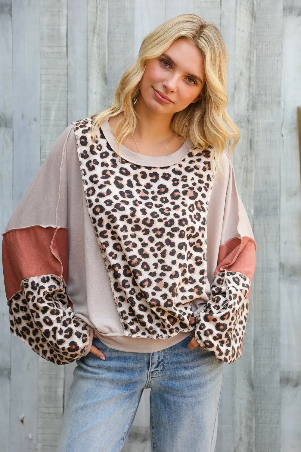 Roaming Free and Easy Leopard Reverse Stitch Sweater sold by Charming Charlie