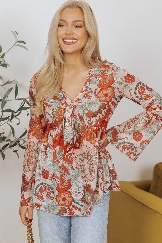 Floral Print Deep V Neck Knot Bell Sleeve Blouse sold by Charming Charlie