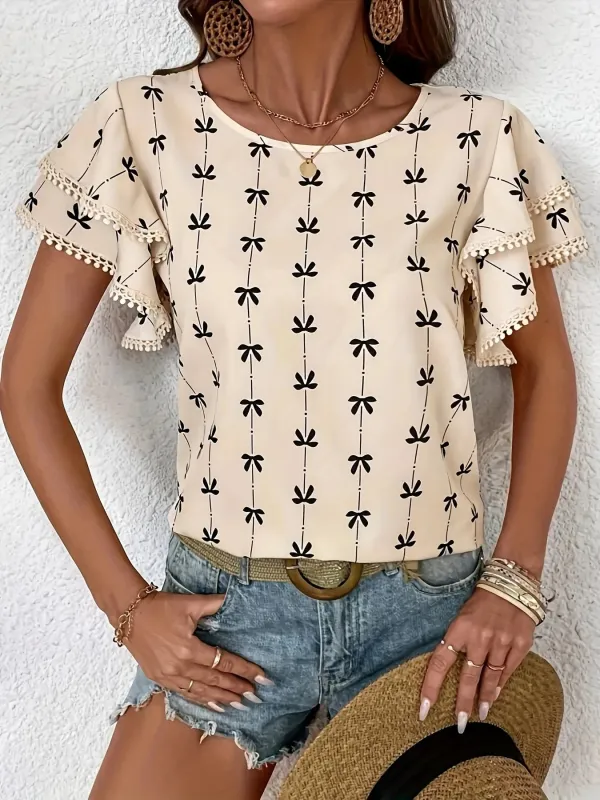 Bow Print Flutter Sleeve Blouse sold by Charming Charlie