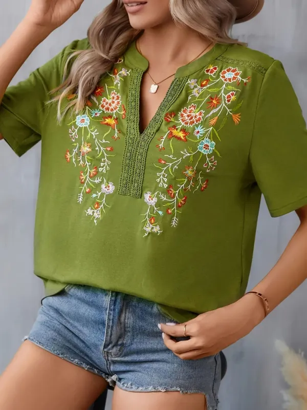 Embroidered Notched Short Sleeve Blouse sold by Charming Charlie