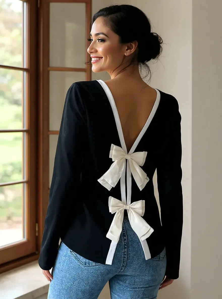 Long Sleeve Bow Tie Back T-Shirt sold by Charming Charlie