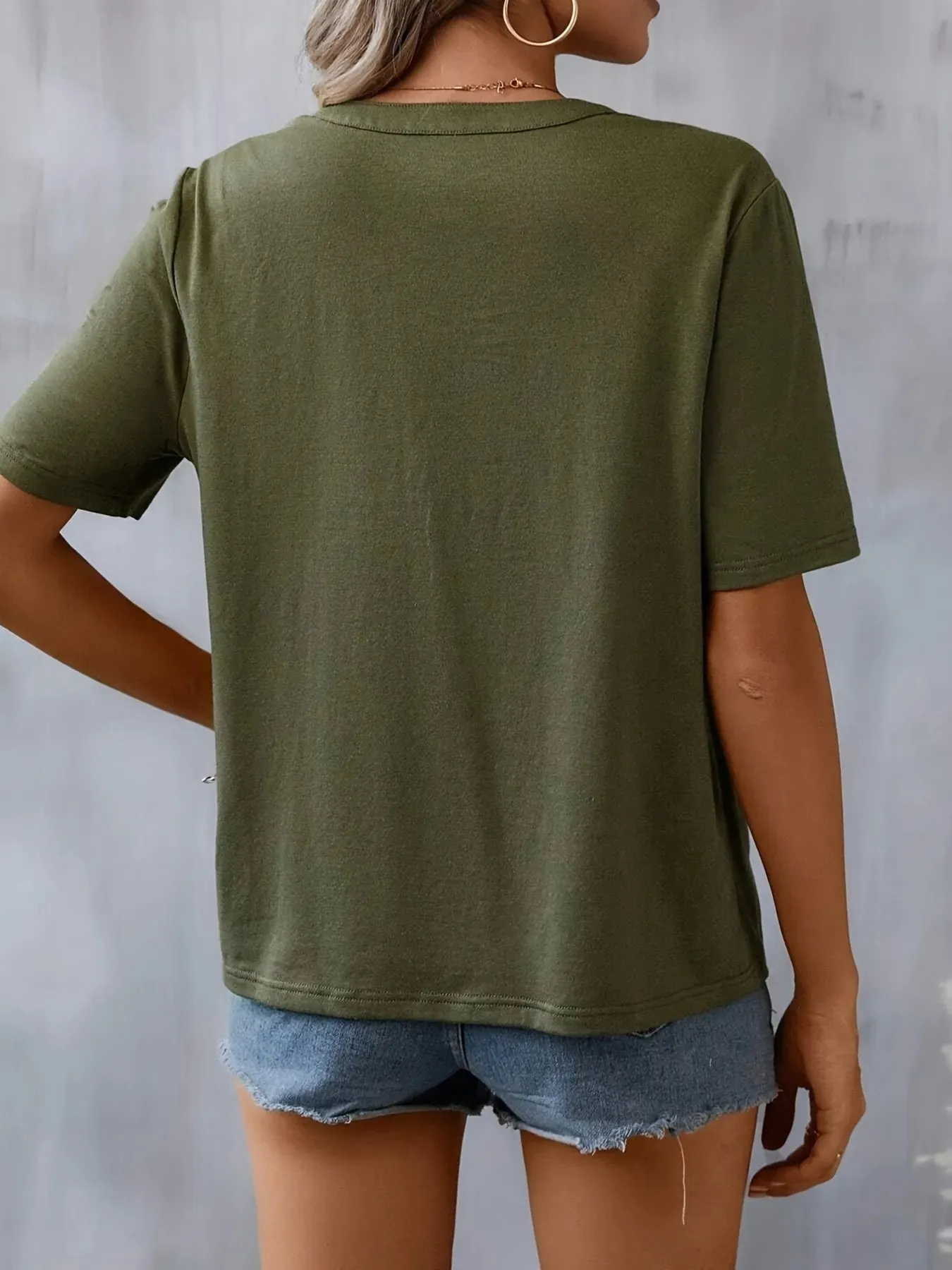 Embroidered Floral Notched Short Sleeve Blouse sold by Charming Charlie product image thumbnail 4