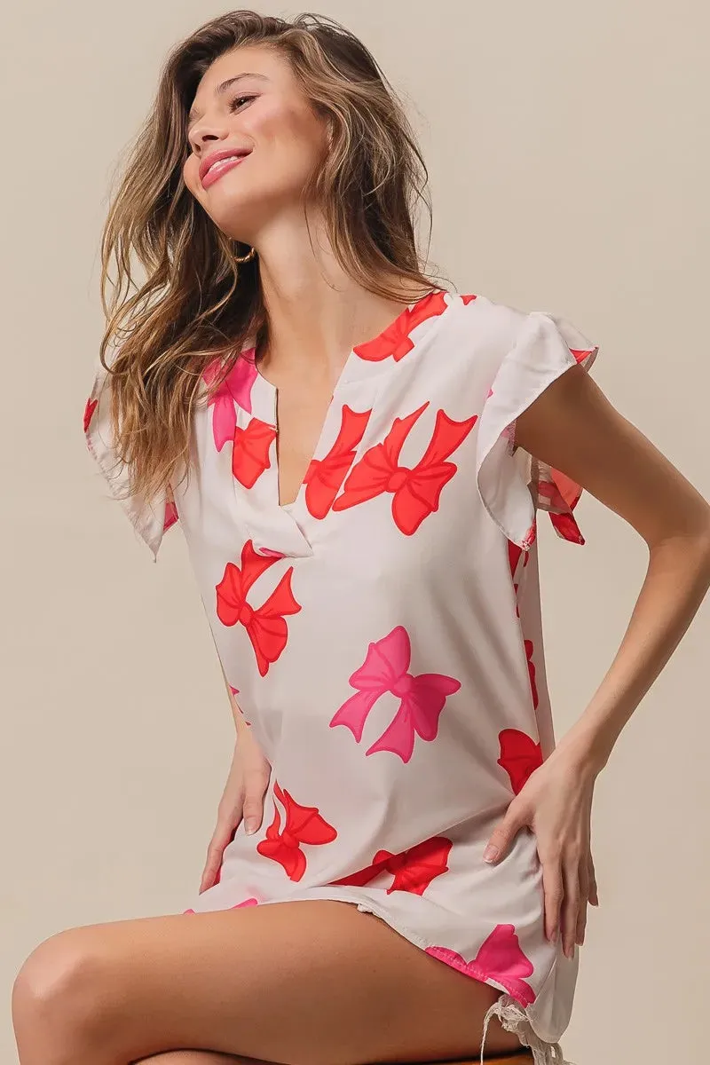 BiBi Bow Printed Woven Ruffled Sleeves V Neck Top sold by Charming Charlie product image thumbnail 3
