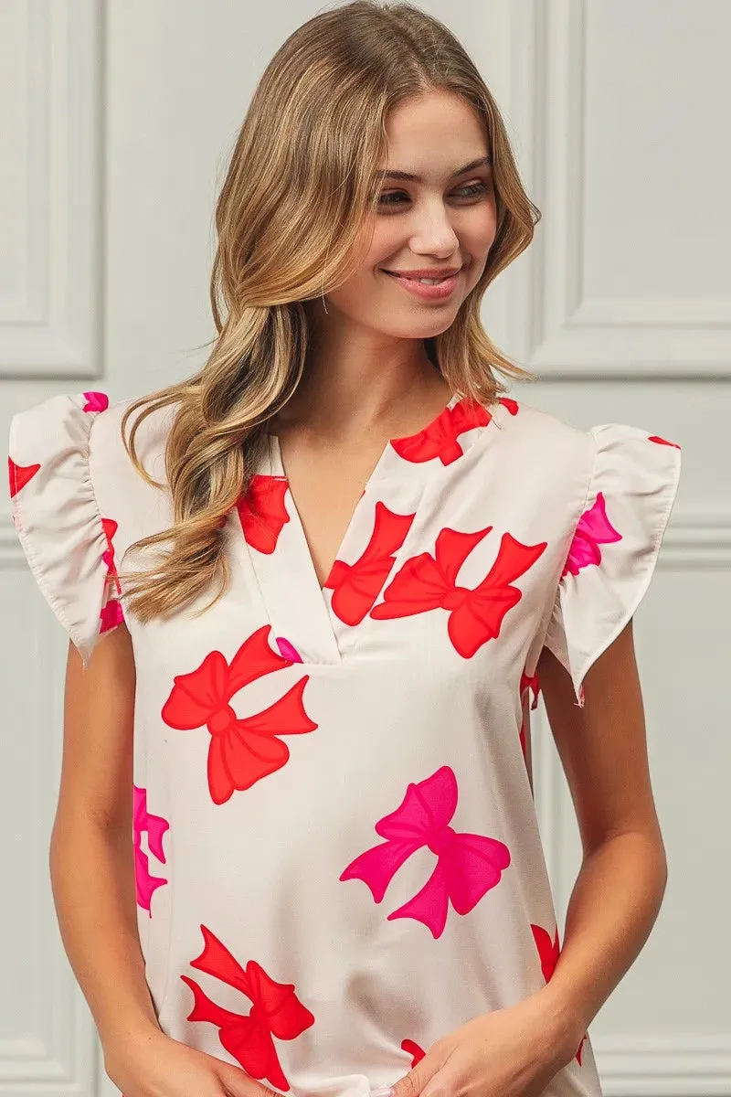 BiBi Bow Printed Woven Ruffled Sleeves V Neck Top sold by Charming Charlie product image thumbnail 2